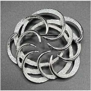 Vintage Sarah Coventry Silvertone “Tailored Swirl” Brooch